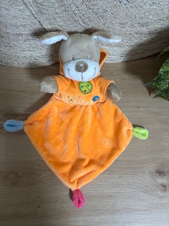 Doudou plat chien orange capuche oiseau nicotoy