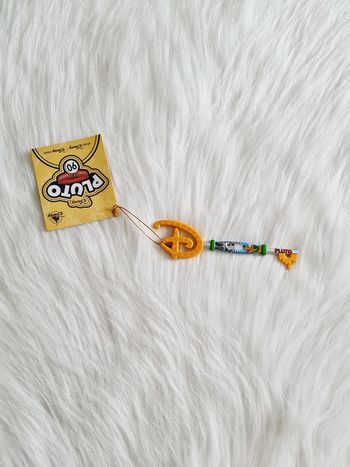 clef de collection les 90 ans de Pluto avec une nouvelle