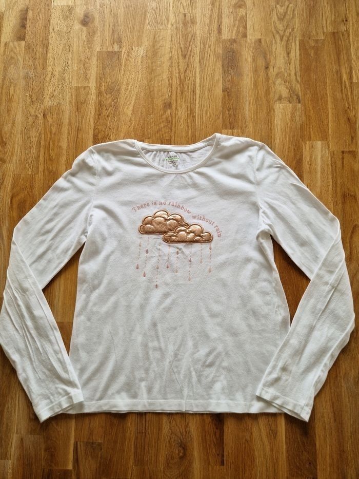 T-shirt manche longue en bon état