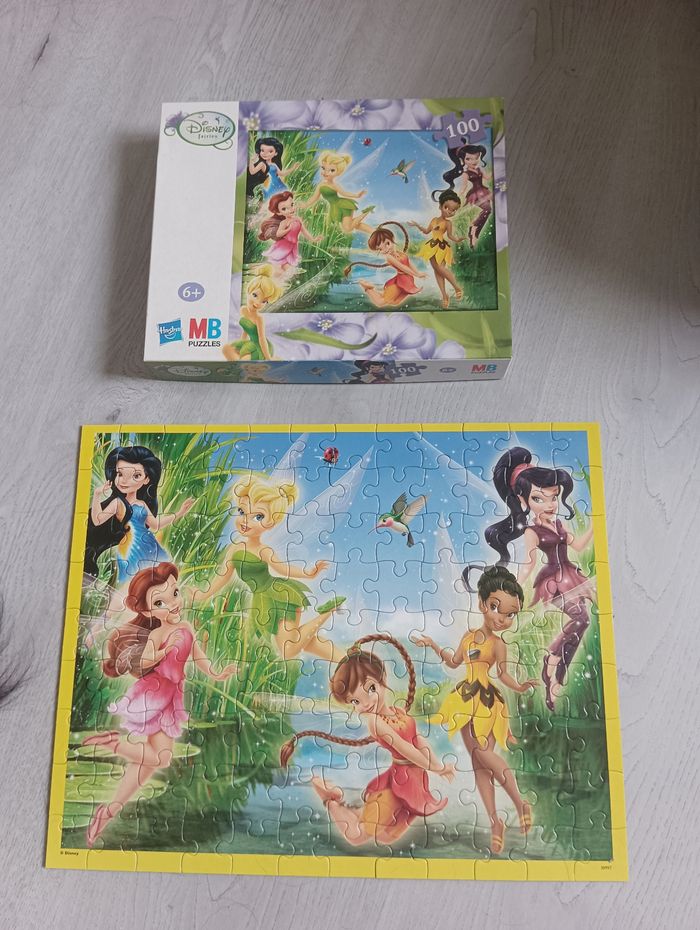 Puzzle fée Clochette Disney fairies
100 pièces 
en Tbe