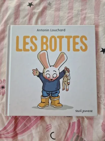 Livre bébé les bottes de seuil jeunesse