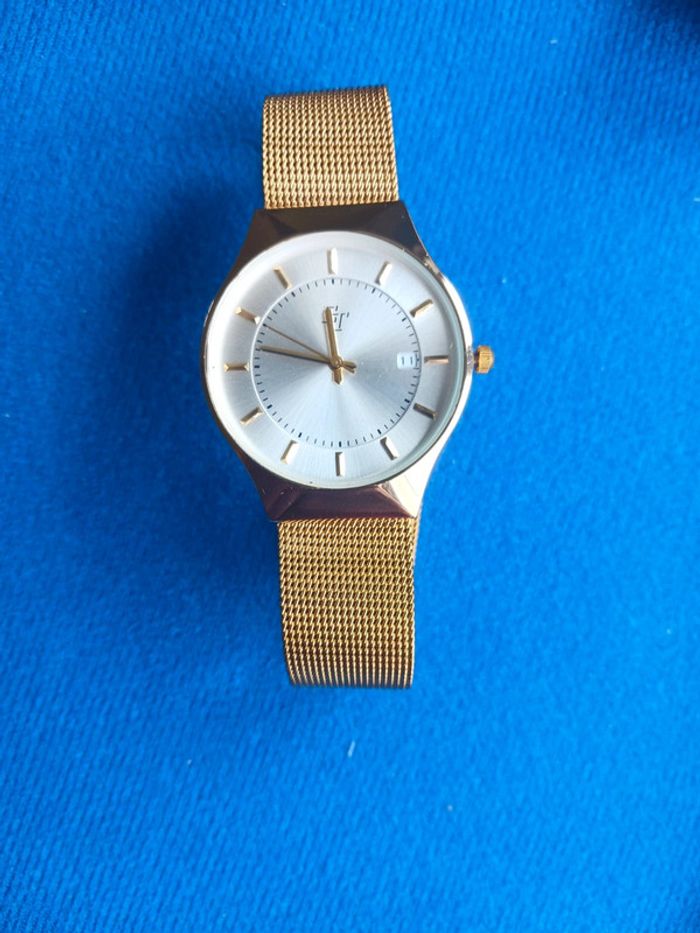 Montre femme doré neuve