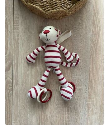 Peluche singe rayé rouge jellycat