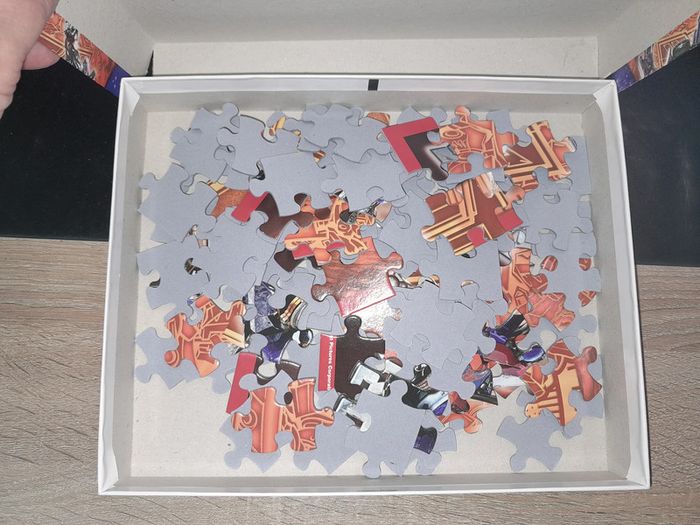 puzzle + 100 pièces Transformers Dark of the moon - photo numéro 2