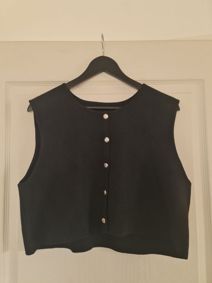 Petit gilet manches courtes