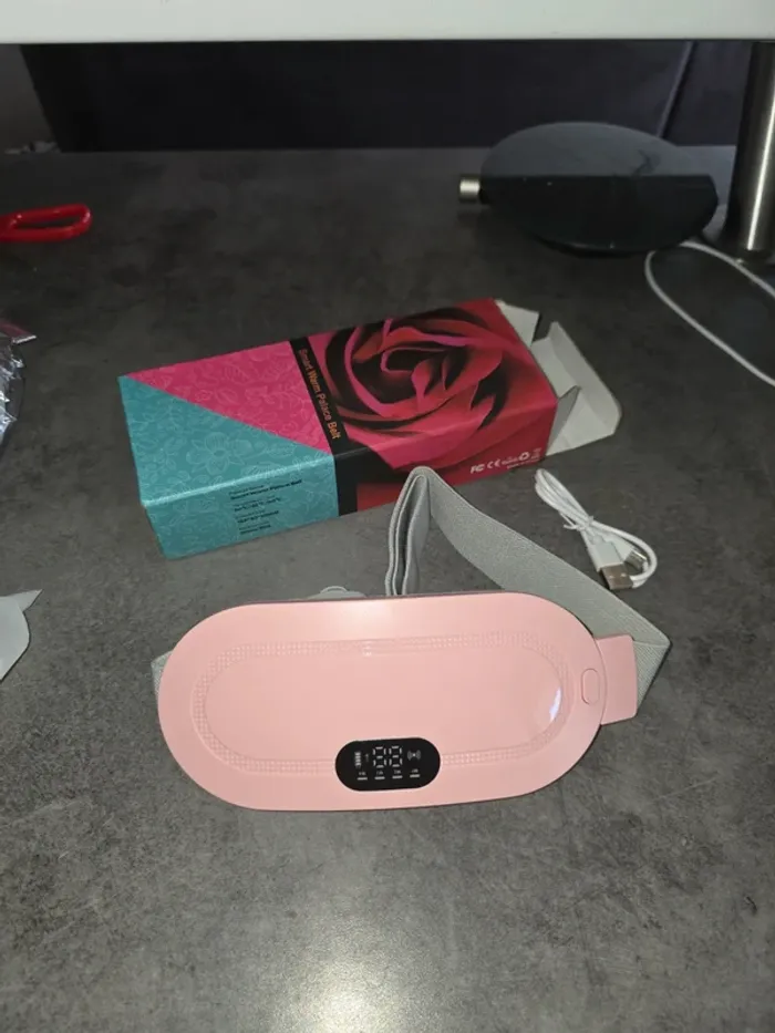 [NEUF] Ceinture menstruelle chauffante et massante rose