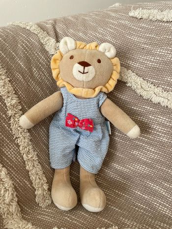 Peluche doudou 28cm corolle lion beige bleu à carreau très bon état