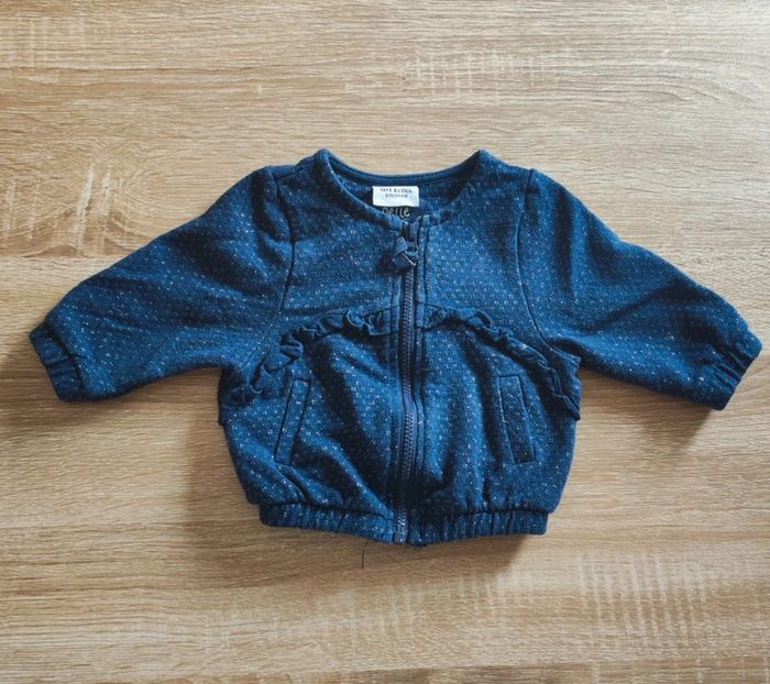 Gilet tape a l'œil 3 mois