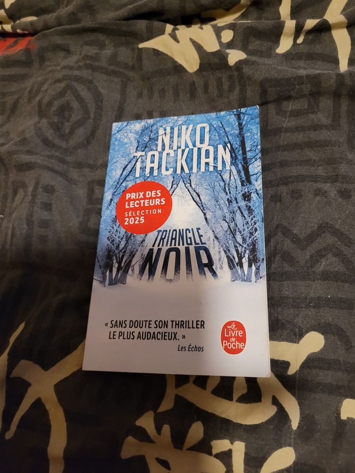Triangle noir Niko Tackian
