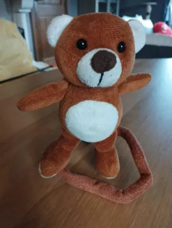 Peluche singe pour parc/poussette ou lit bébé