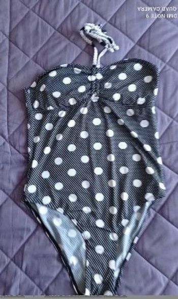 Maillot de bain noir à pois blancs