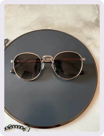 Lunette de soleil ronde noire argenté