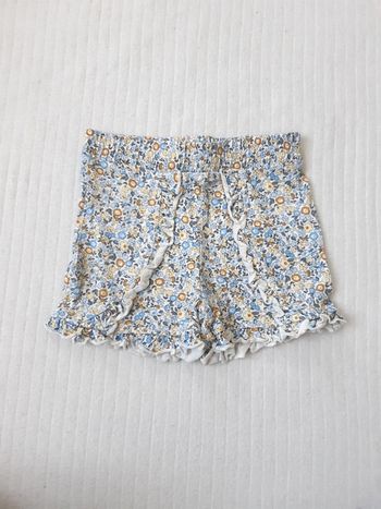 Short fleurs Primark 12/18 mois