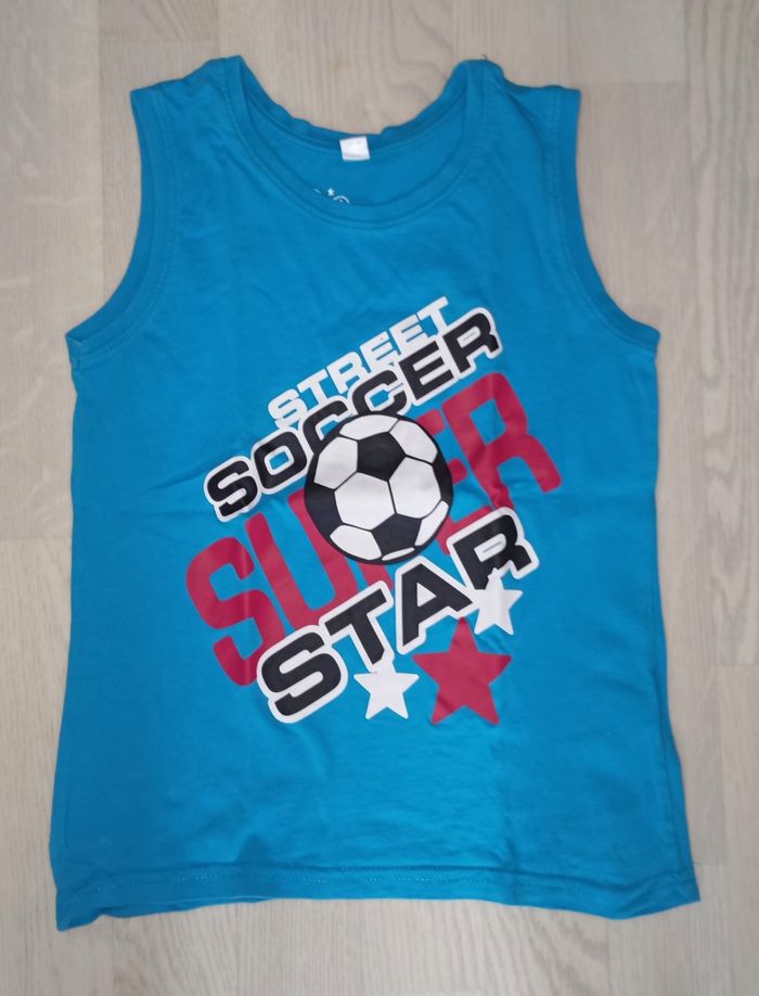 Débardeur bleu clair motif football Bon Prix 
T. 8 ans
