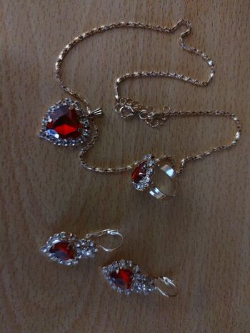 Collier bague boucles d'oreilles 