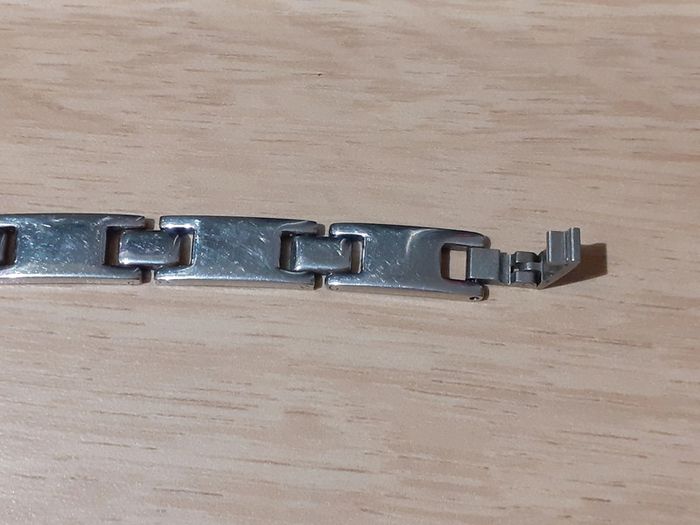 Bracelet homme en acier inoxydable et plaqué or - photo numéro 6