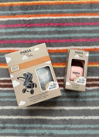 Habillage pluie + boite a tetines NEUF