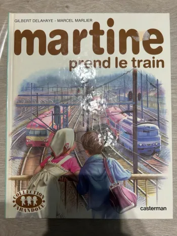livre vintage "Martine prend le train"