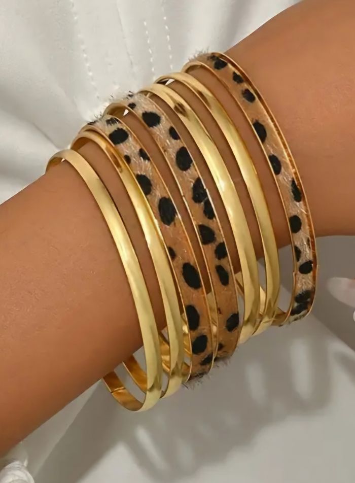 Lot de 7 bracelets dorés – effet léopard / neufs