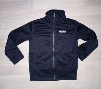 Veste de jogging noir nylon Nike 
T. 122-128 cm