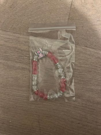 Bracelet Stitch perles rose neuf