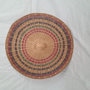 Décoration ronde murale en rotin osier multicolores du Laos
