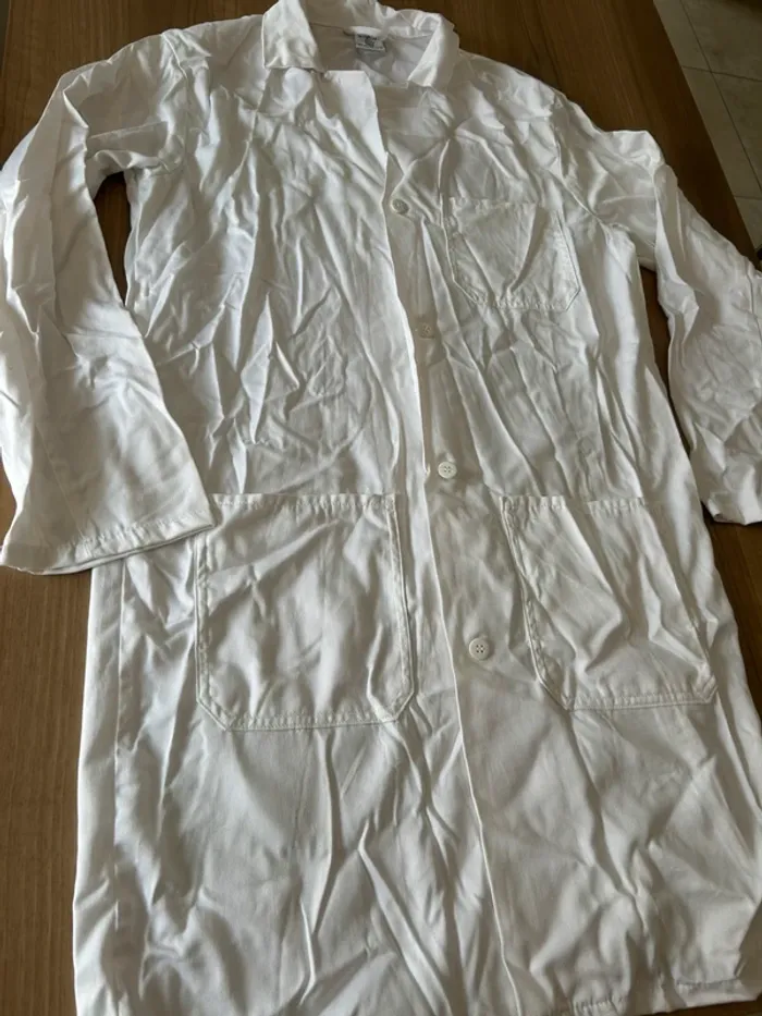 Blouse blanche avec boutons et poches - photo numéro 6
