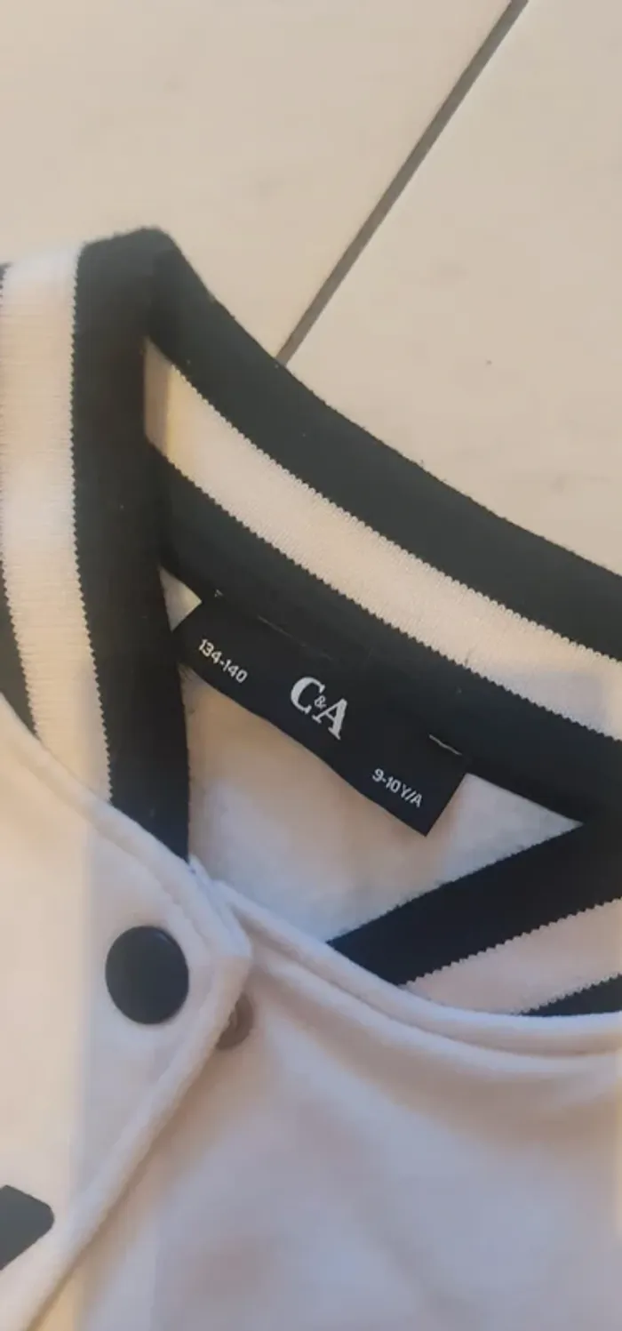 Blouson mi saison. 9/10ans - photo numéro 3