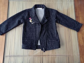 Jolie veste noire pailletée