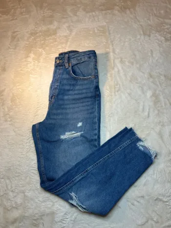 Jean boyfriend troué