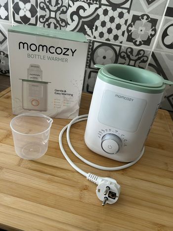 Chauffe biberon momcozy