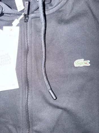 Survetement lacoste  taille 5 