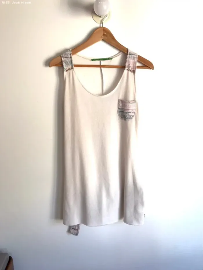 Haut sans manches blanc cassé taille 36 neuf jamais porté