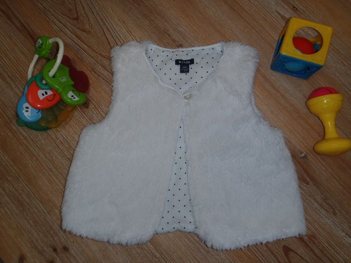 boléro en fourrure doublé pois noir