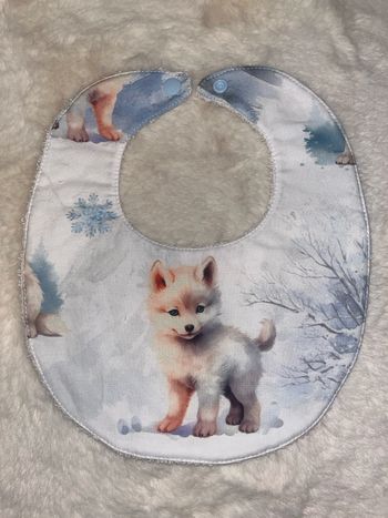 Bavoir loup 0/6 mois 