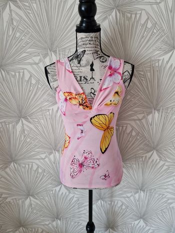 Joli haut motifs papillons taille 36