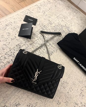 Sac / pochette noir et argenté matelassé Yves Saint Laurent