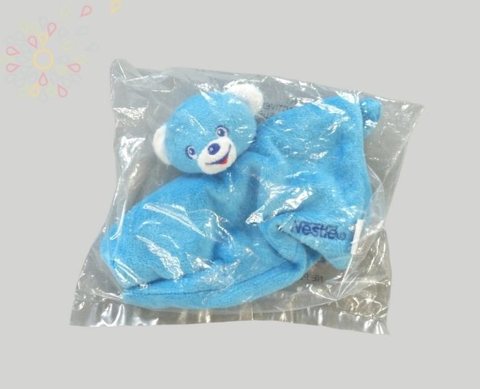 Doudou ours carré plat velours bleu blanc Nestlé 18 cm