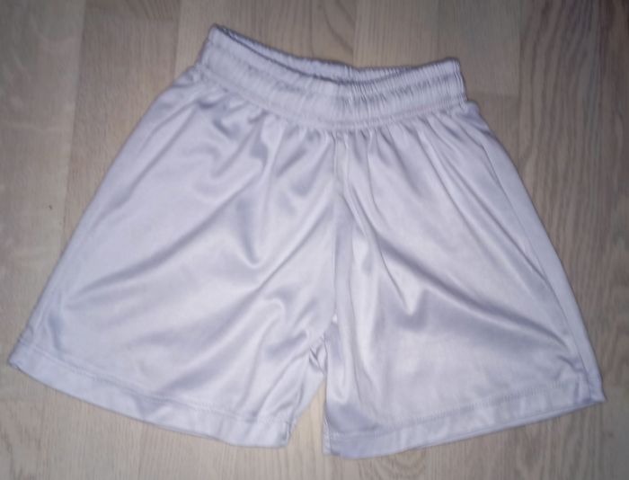 Short en nylon blanc
T. 6 ans