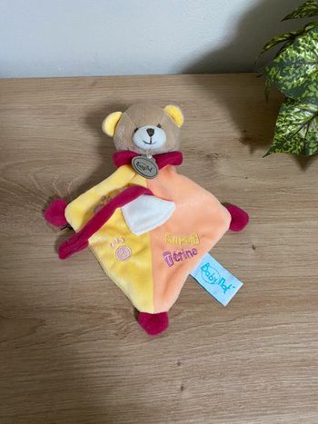 Doudou plat ours jaune saumon rouge super tétine baby nat