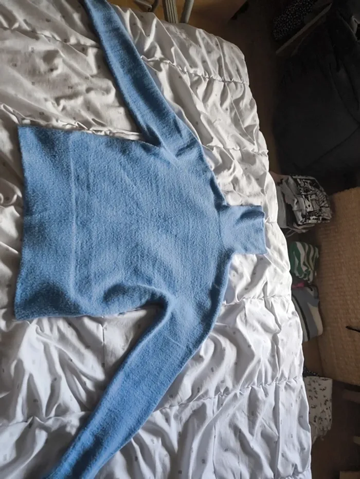Pull col roulé bleu