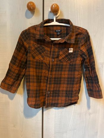 Chemise à carreaux marron et noir