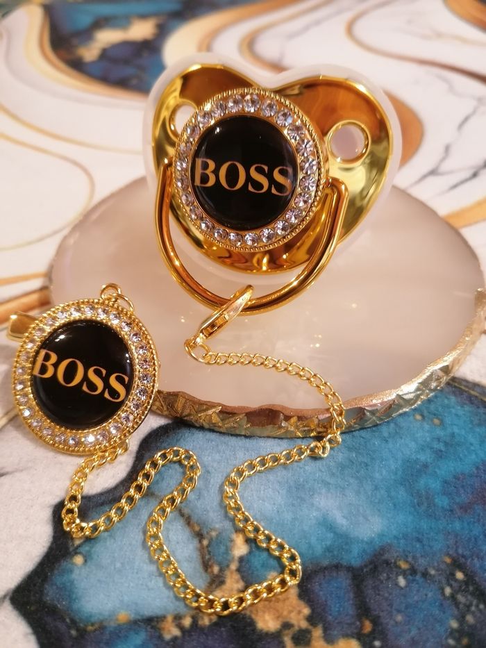 Tétine doré boss - photo numéro 2