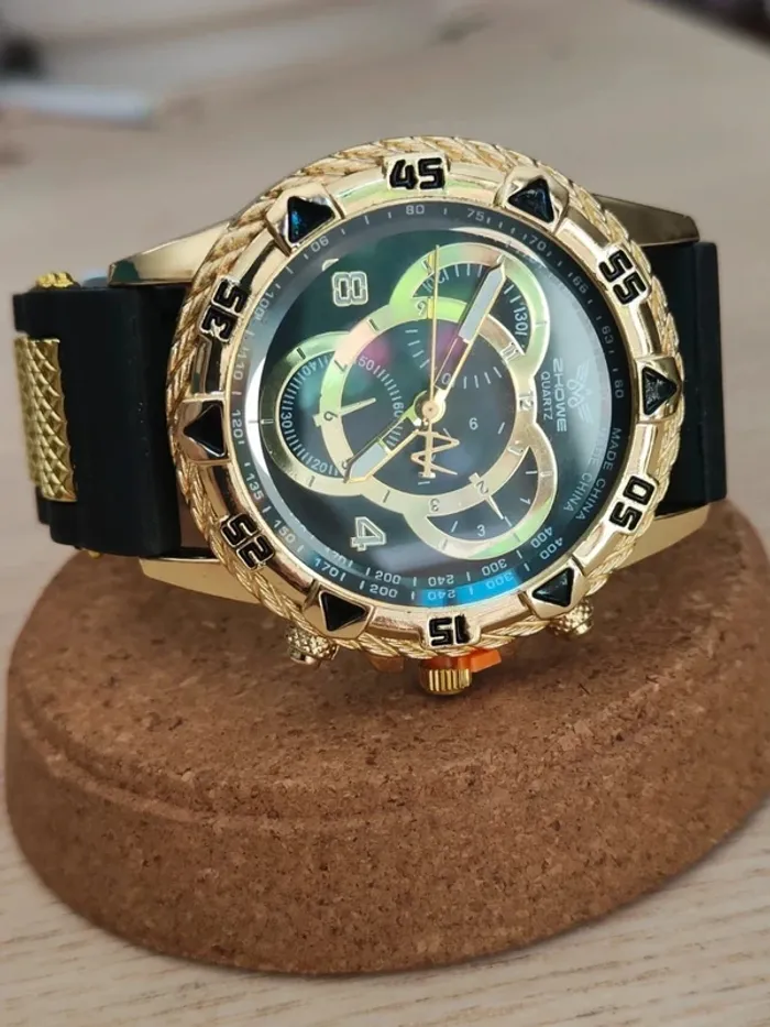 Montre large noire & dorée, en reliefs - photo numéro 2