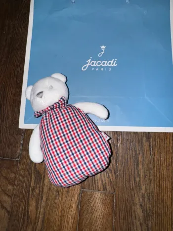 peluche grelot Jacadi l'étiquette arrière a été coupée