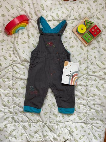 salopette gris pressions entre les jambes 6 mois orchestra