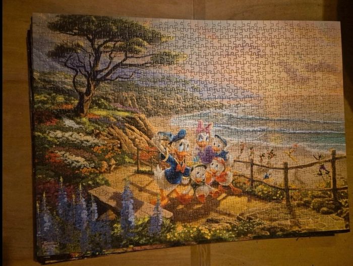 Puzzle disney schmidt 1000 pièces  " Donald et Daisy à la plage " - photo numéro 2