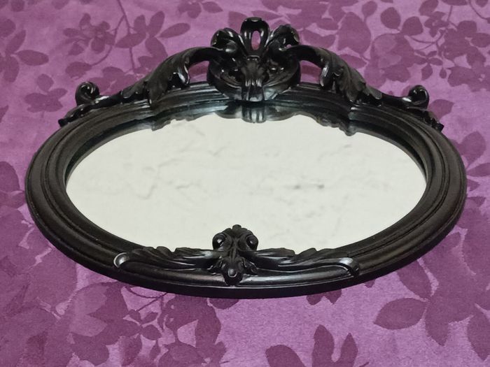 Miroir oval noir