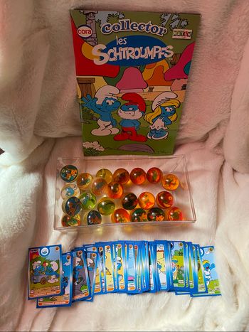 Collector schtroumpf + 64 cartes charades+ 22 balles rebondissantes