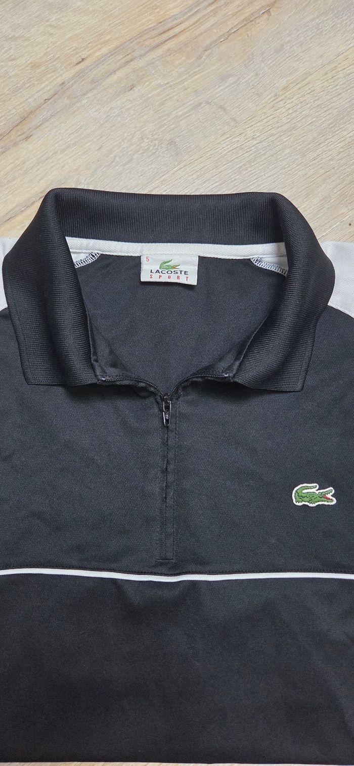 Polo Lacoste taille 5 / L noir et blanc Très bon état - photo numéro 2